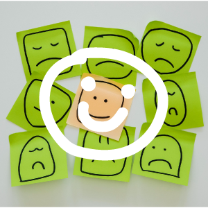 imagen con varios iconos de caras expresando emociones